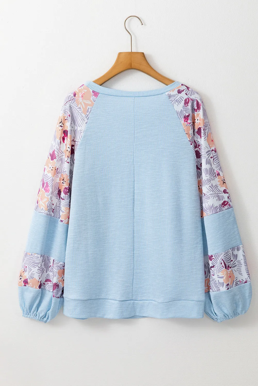 Beau Blue - Chemisier texturé à manches ballon et patchwork floral